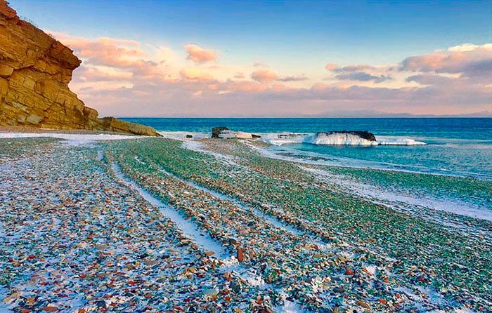 Russians Throw Away Empty Vodka And Beer Bottles, Ocean Turns Them Into Colorful Glass "Pebbles"