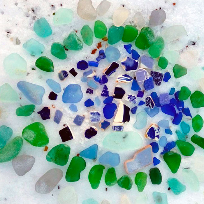 Russians Throw Away Empty Vodka And Beer Bottles, Ocean Turns Them Into Colorful Glass "Pebbles"