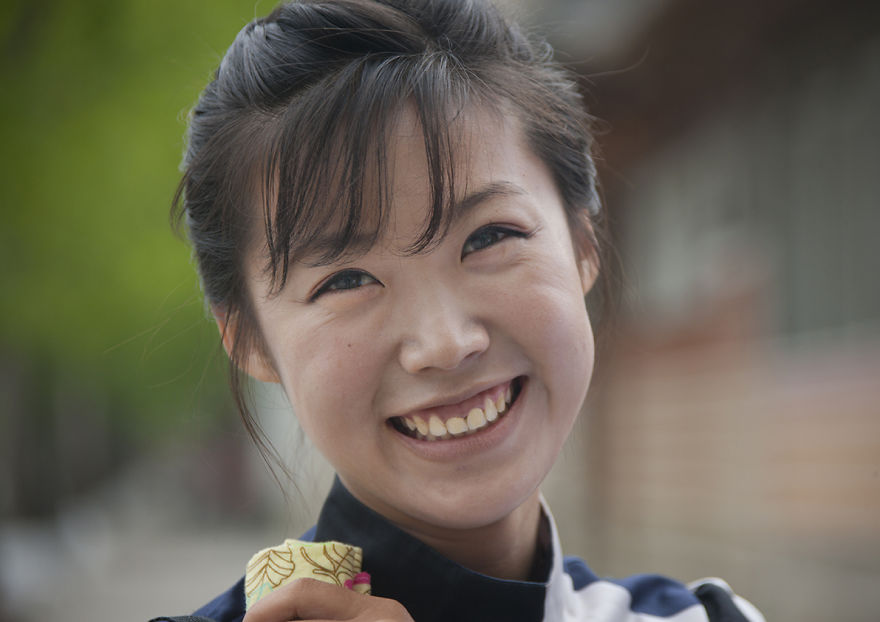 Beautiful Young Woman Smiling At Camera, Kaesong, North Korea