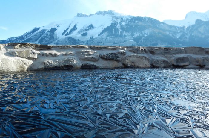 Frozen Pond In Switzerland
