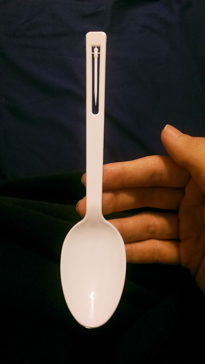 plastic spoon with a built-in toothpick