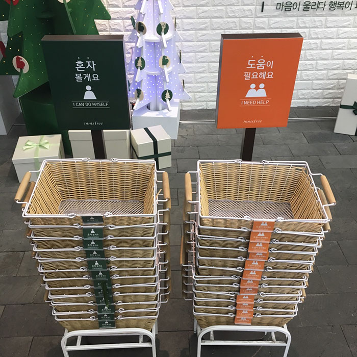 two rows of shop baskets