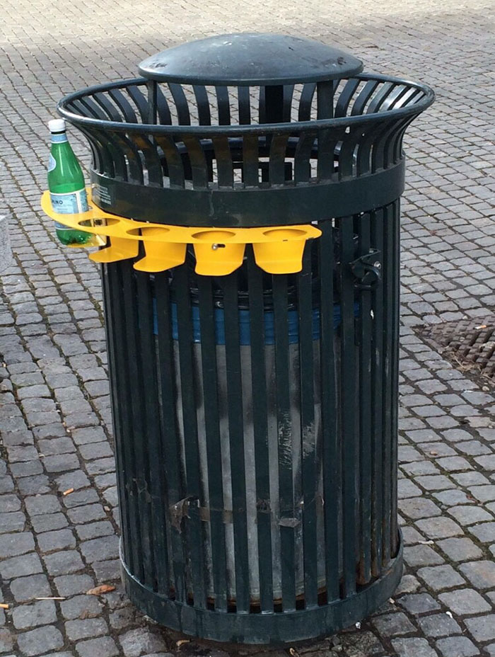 This Thrash Can Has A Bottle Rack So People Don't Have To Dig Through The Garbage To Find Some Bottles And Cans