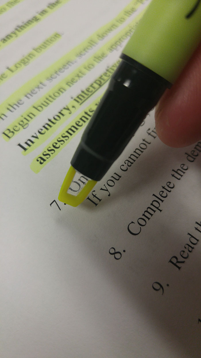 Highlighter on the background of text on the paper