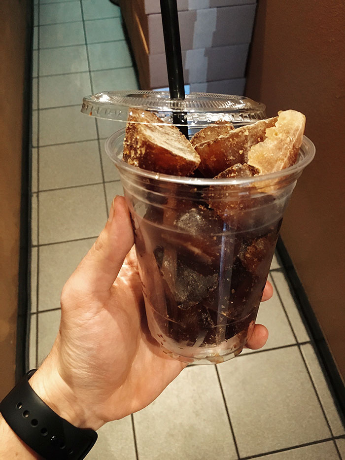 frozen coffee cubes in a plastic glass