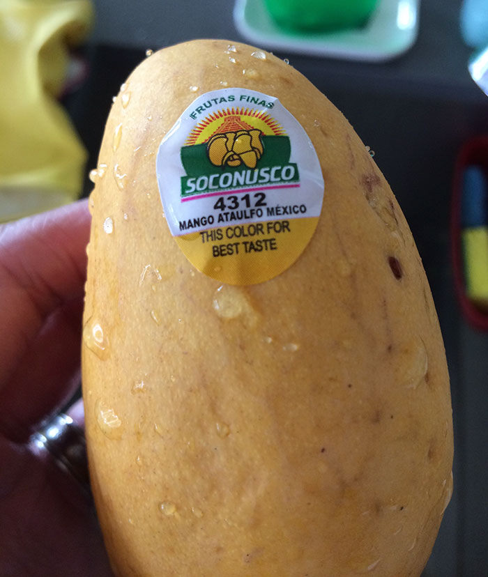 mango with a sticker