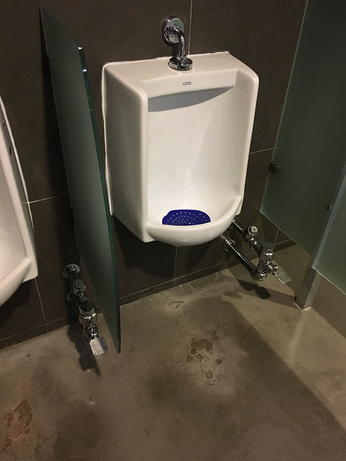 urinal that allows flushing with your feet