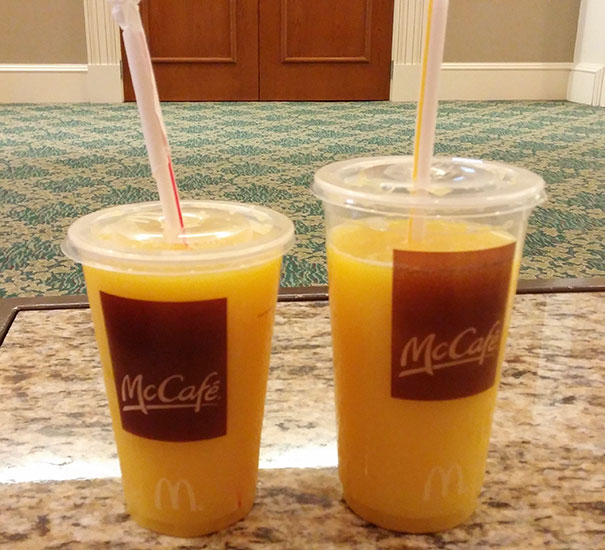 A Medium & A Large Orange Juice