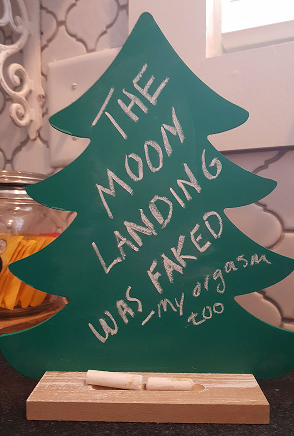 Wife Bought A Chalkboard Xmas Tree To Count Down The Number Of Days Until Xmas. I've Been Erasing The Number And Writing Conspiracy Theories Instead, Infuriating Her. Today, She Took It Too Far