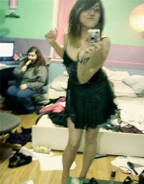 woman taking mirror selfie 