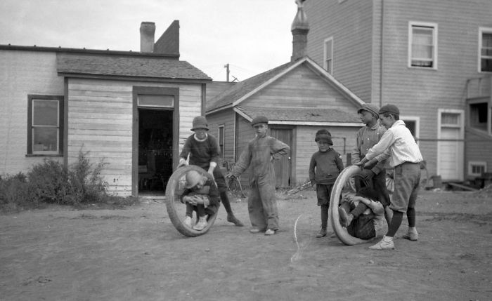 Group Of Gleichen Boys Playing In Rubber Tires, Alberta, 1920s