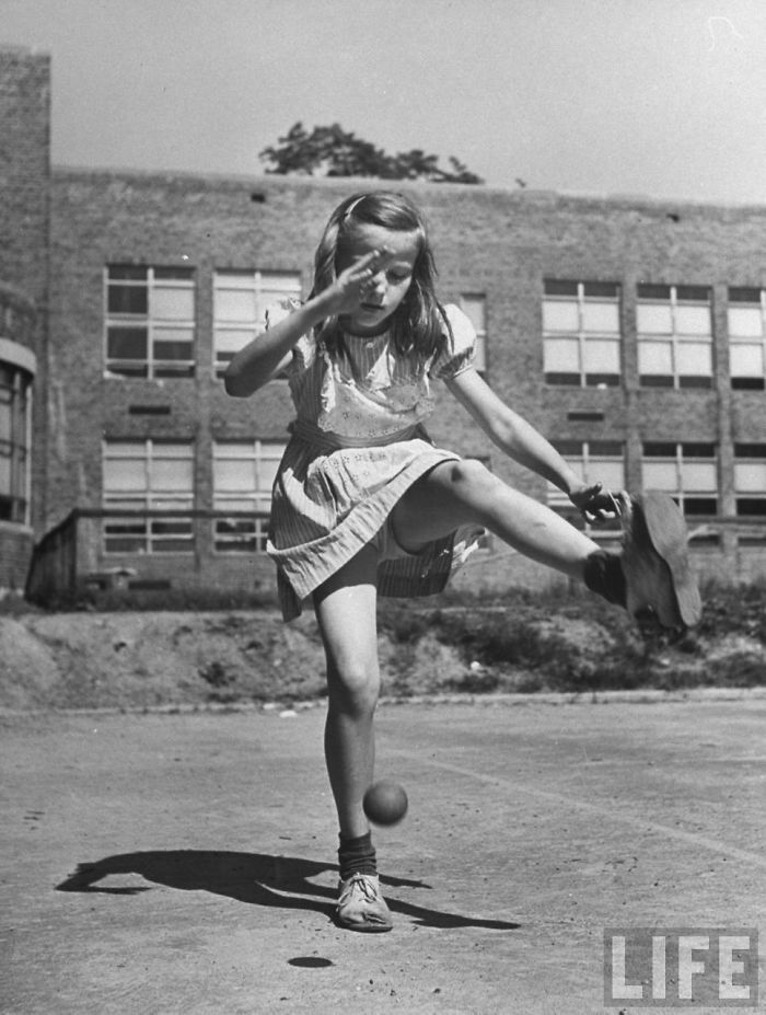 Girl Playing Stickball, New York, 1947