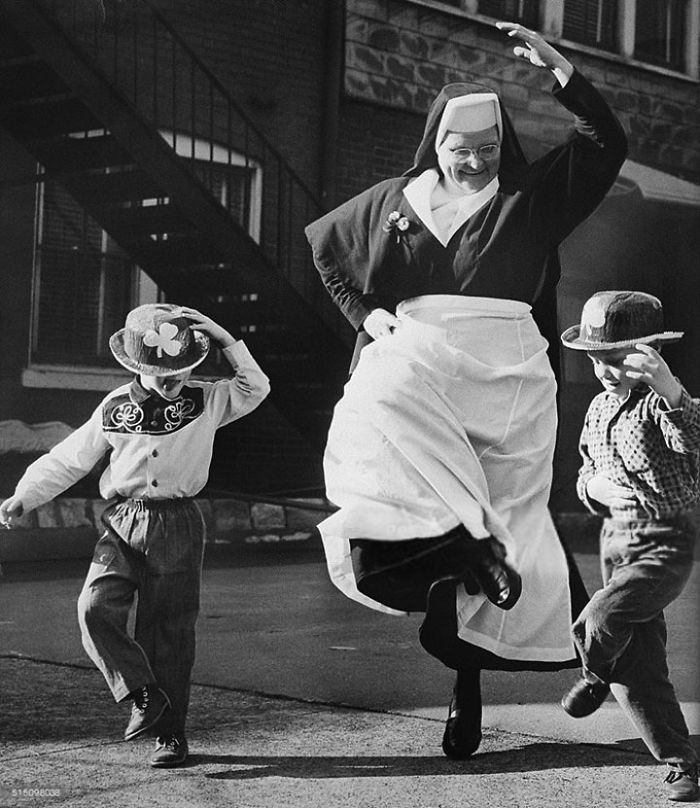 Nun Dancing With Children On Saint Patrick's Day, Ireland, 1964