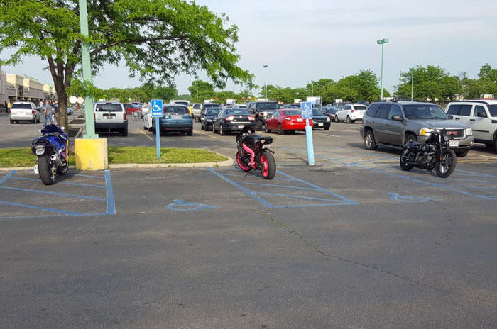 The Stripes Next To Handicap Spots Are Not Motorcycle Parking