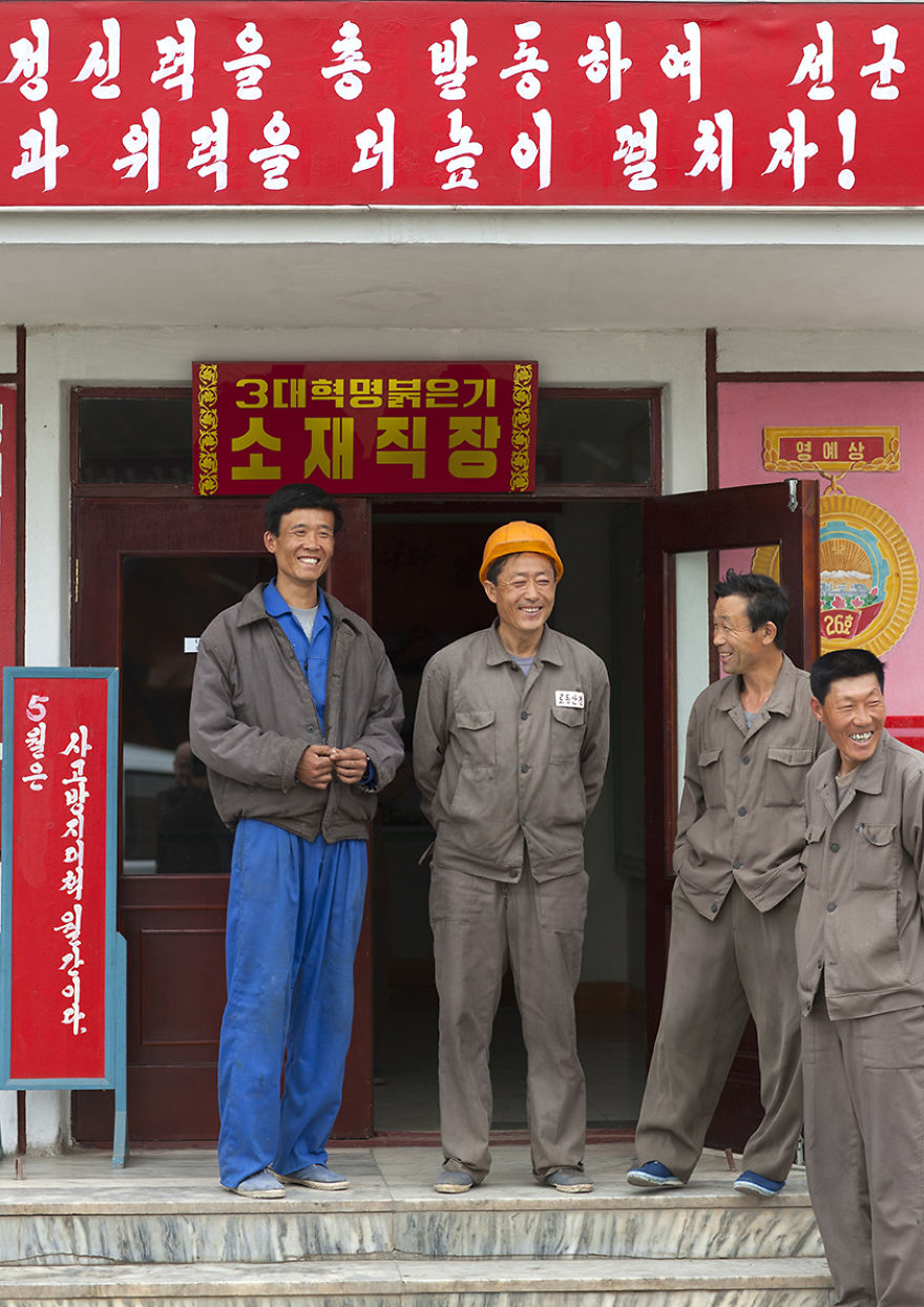 Workers During A Break, Nampho, North Korea