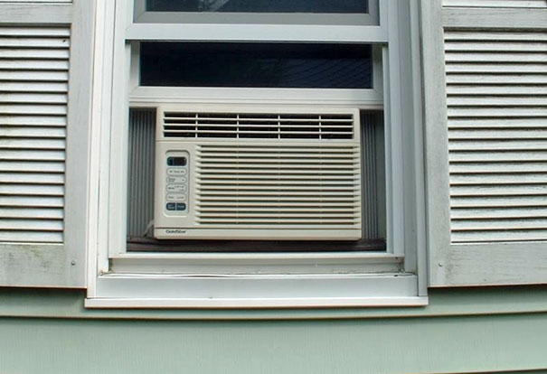 Reverse Your Window A/C Unit Like So To Save On A Costly Heating. It's Also Good For The Environment Because It Cools The Outside, Reducing Global Warming