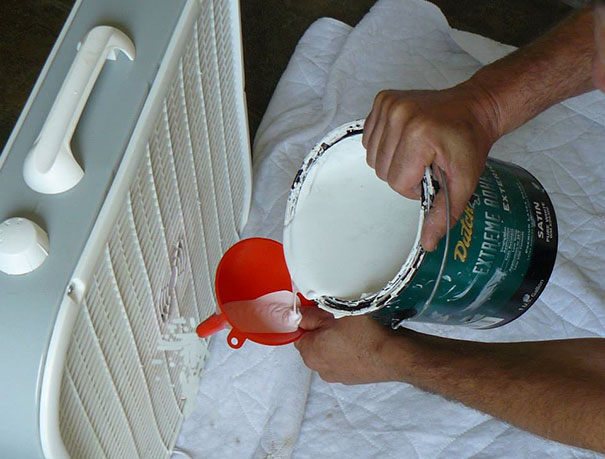 Use A High-Powered Box Fan And Funnel To Quickly Paint Interior Walls