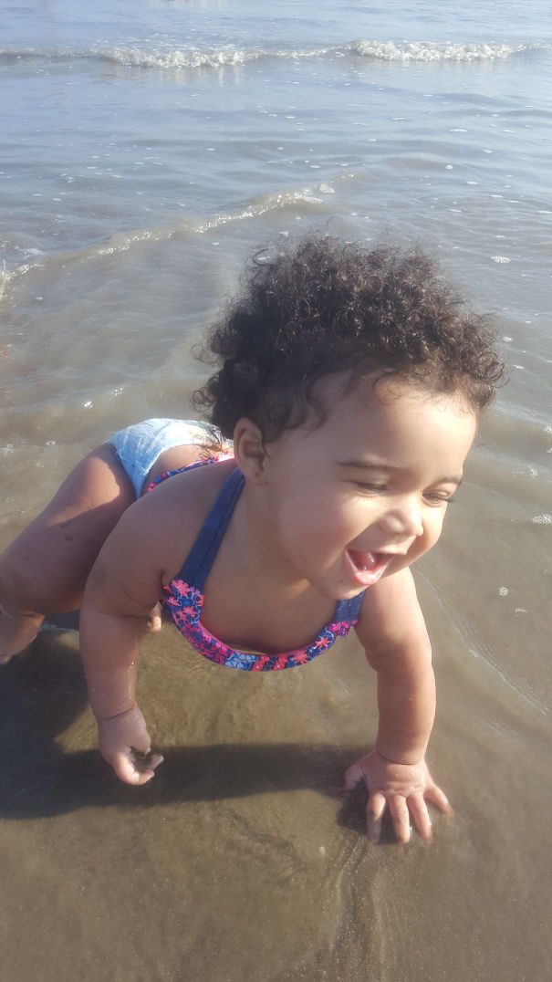 My Grand Daughter's First Time At The Beach.