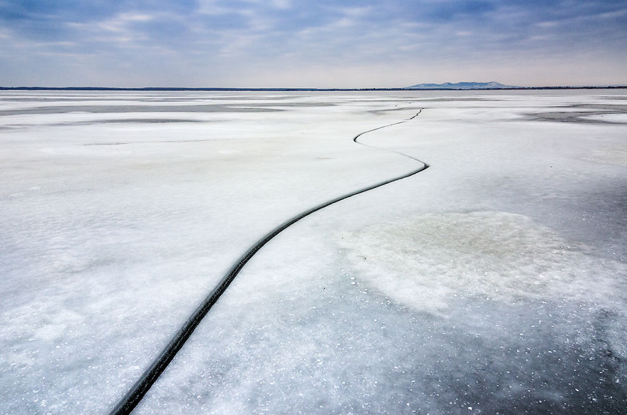 The Undiscovered Beauty Of Romania Expressed In Ice Fishing Pictures