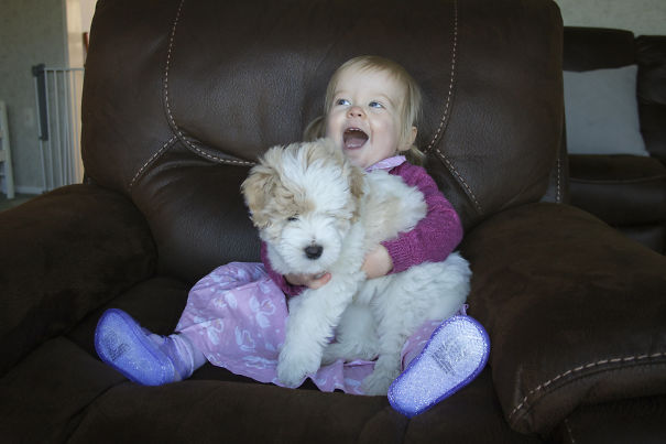 My Daughter Holding Her Puppy For The First Time.