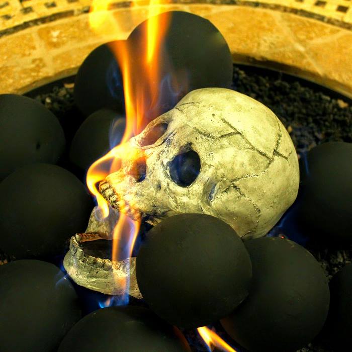 Terrifying Fireproof Human Skull Logs For Your Next Family ...