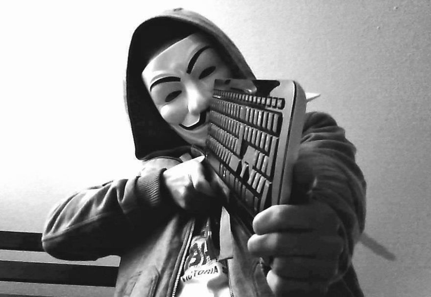 Anonymous Holding Keyboard As A Gun!