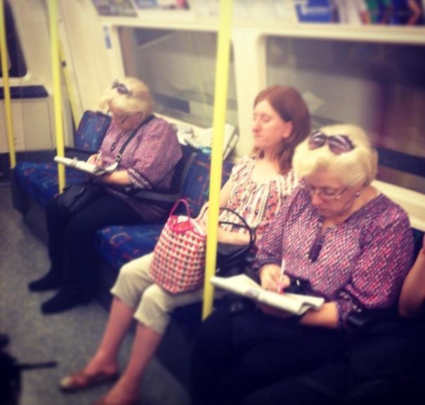 Two womans reading and looking similar
