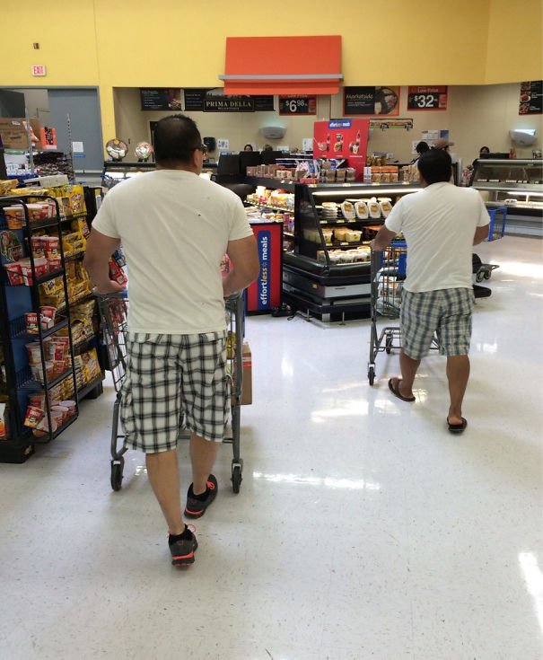 Two man at grocery store wearing same clothes