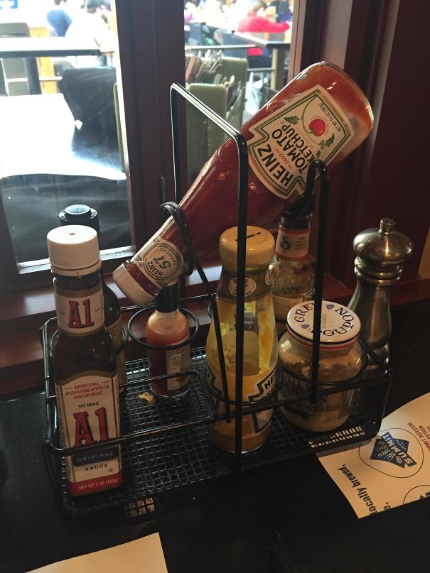 This Restaurant Tabletop Condiment Caddy Has A Special Holder To Make Sure The Ketchup Bottle Is Always Primed For Use