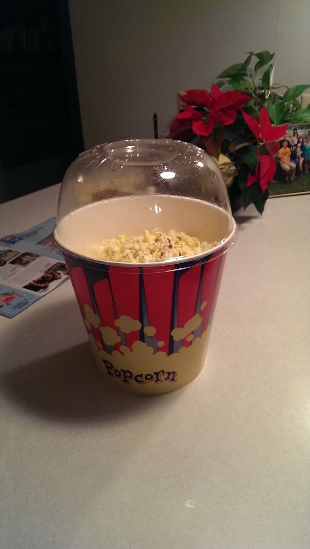 This Theater Has A Cool Popcorn Bucket With A Lid On It To Use While Shaking It To Coat It And To Use As A Bowl