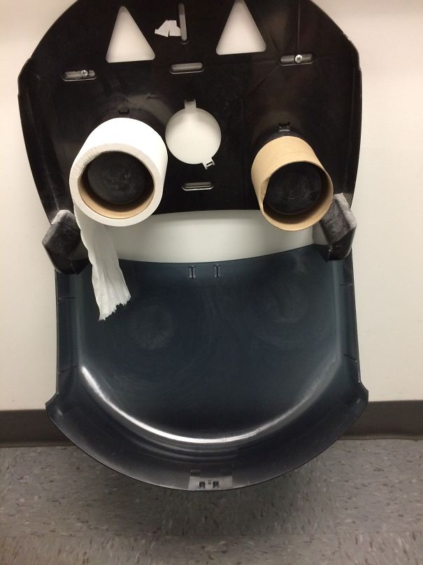 Happy Toilet Paper Dispenser