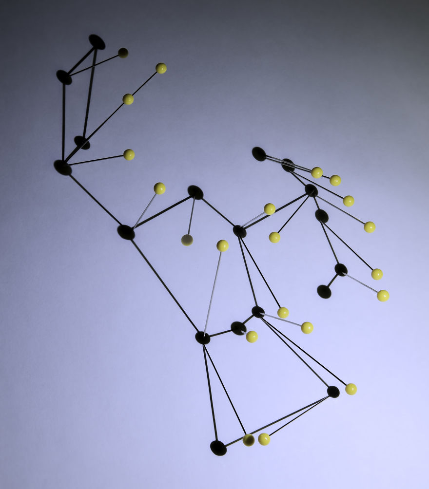A Photograph Of The Orion Constellation, Using Pins And Shadows