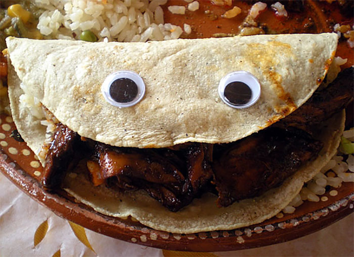 The Cheerful Taco Who Looks Up At You With A Pair Of Googly Eyes