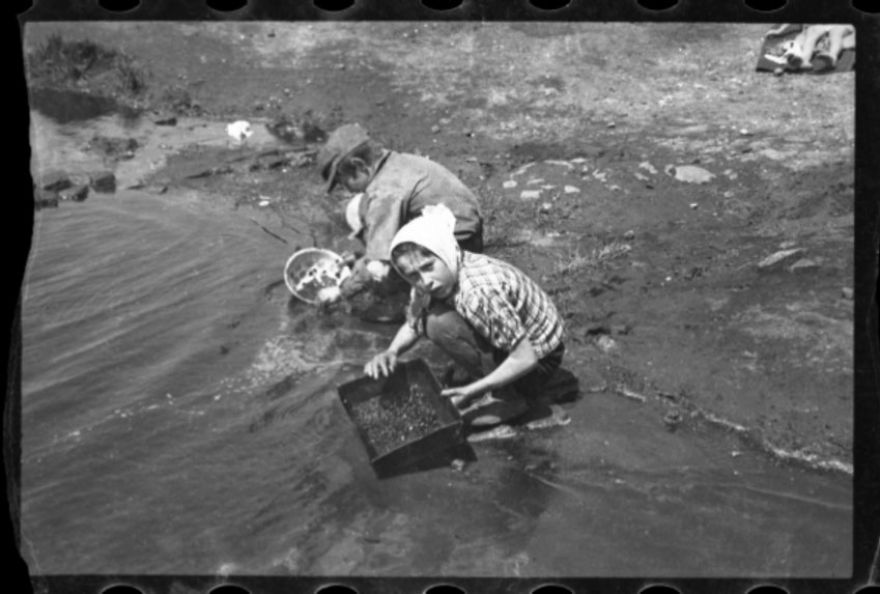 1940-1944: Children In Pond Searching For Items To Salvage