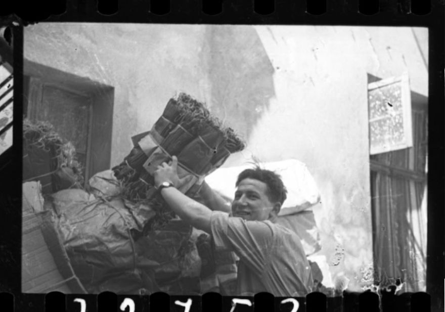 1940-1944: Male Factory Worker Unloading Mattress Springs