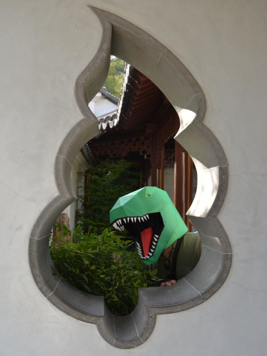 T-Rex Deals With Modern World In Paper Dinosaur Mask