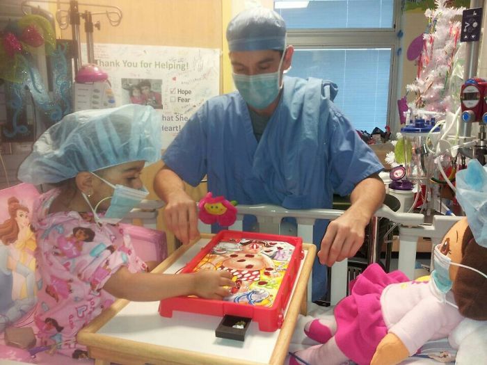 My 2 Year Old Niece Who Has Been Hospitalized Passes The Time By Playing Operation With Her Doctor And Dora The Explorer. All Scrubbed Up And Ready For Surgery!