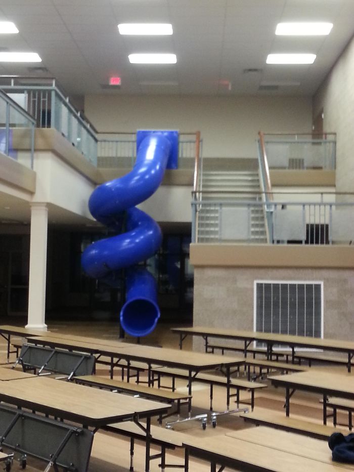 My Kid's New School Has A Twirly Slide To Get Downstairs