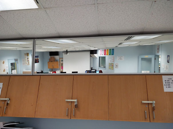 This Class Has A Mirror At The Back So The Teacher Can See The Students' Monitors