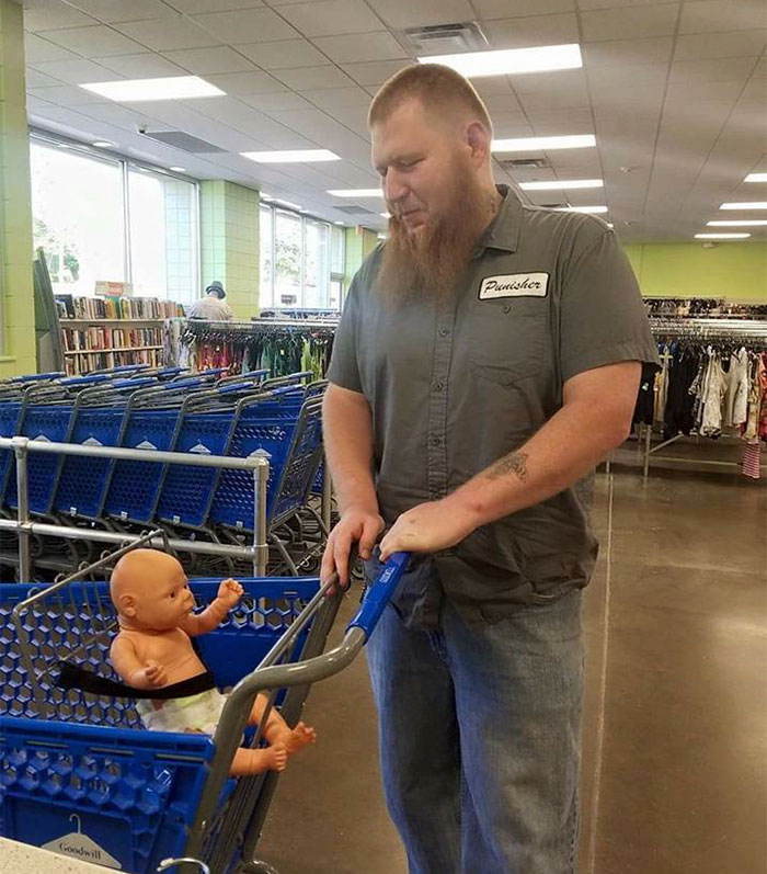 This Intimidating Guy Took A Baby Doll Shopping With Him, And The Story Behind It Is Amazing