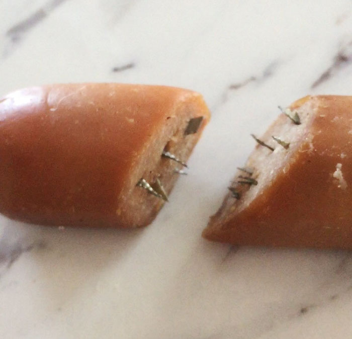 Dog Owner Shocked After Finding Hot Dogs Stuffed With Razor Blades In Her Yard
