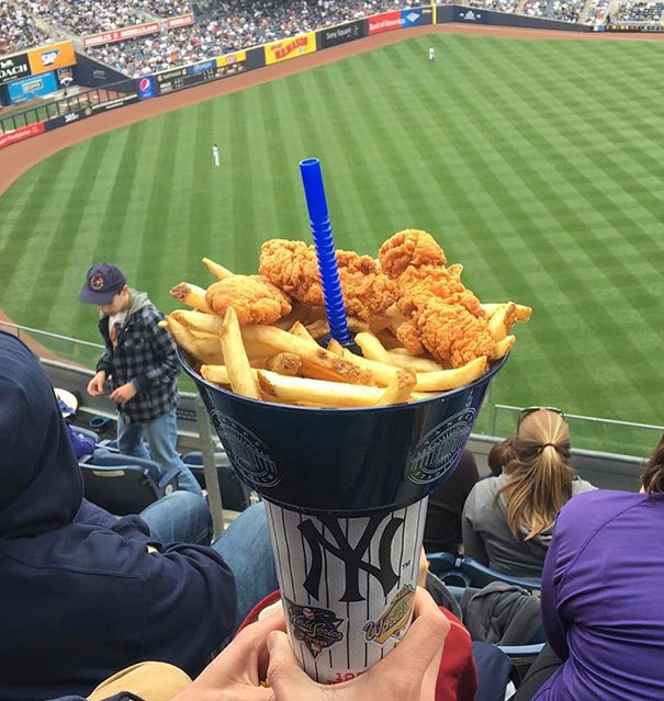 Bowl Of Chicken And Fries, With A Straw To Your Soda Through The Center. One Hand Holds All The Things, So You Can Eat With The Other