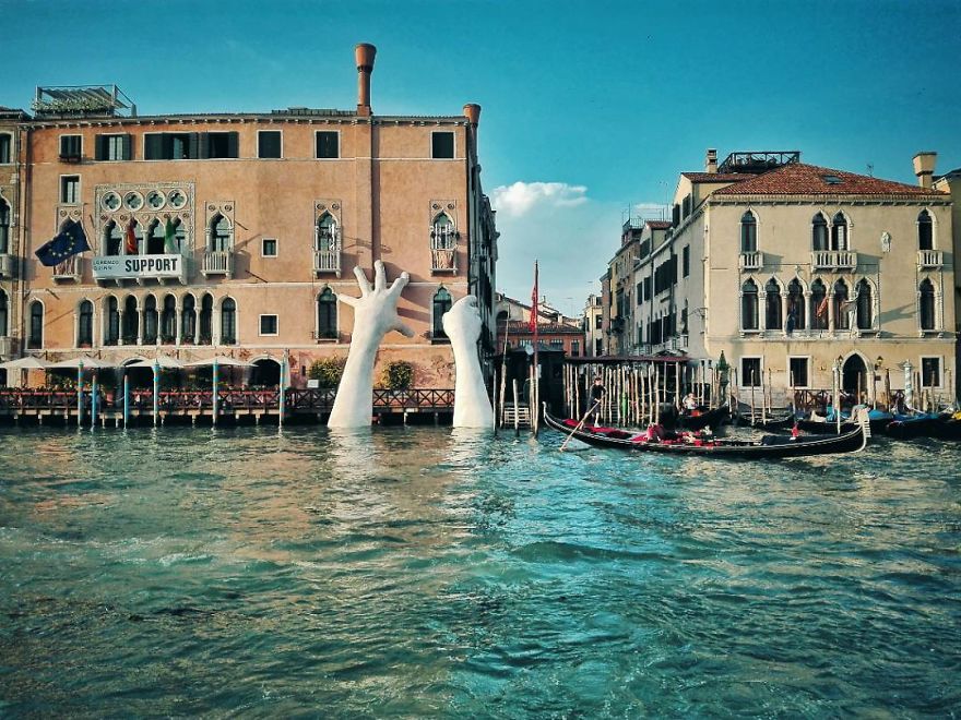 Support: Giant Hands Rise From A Canal In Venice To Send A Powerful Message About Climate Change