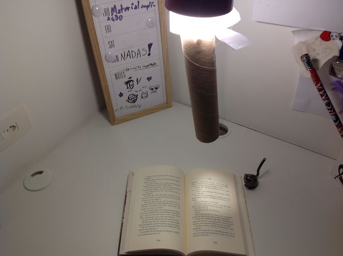 Used An Articulated Lamp And An Recycled Paper Towel Tube To Create A Crappy Reading Light. As Least It Works ;)