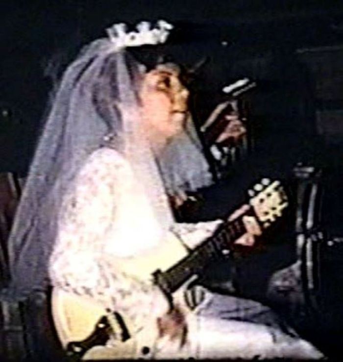 My Mother, Jeanette, Playing Guitar At Her Own Wedding In 1966. She Said The Band Sucked So She And Her Band Played For The Crowd Instead. They Were Called Little Jeanie And The Caravan.