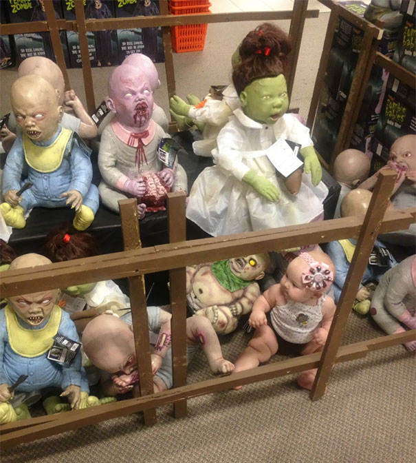 My Friend Decided To Put Her Baby With All The Zombies At The Halloween Store