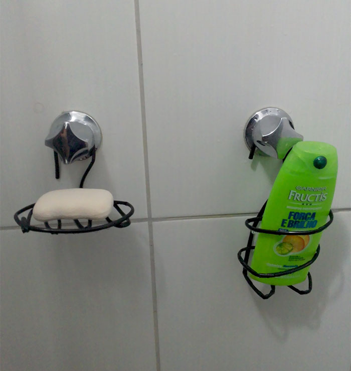 I Had Nowhere To Put My Soap Or Shampoo, So I Improvised With Some Coat Hangers