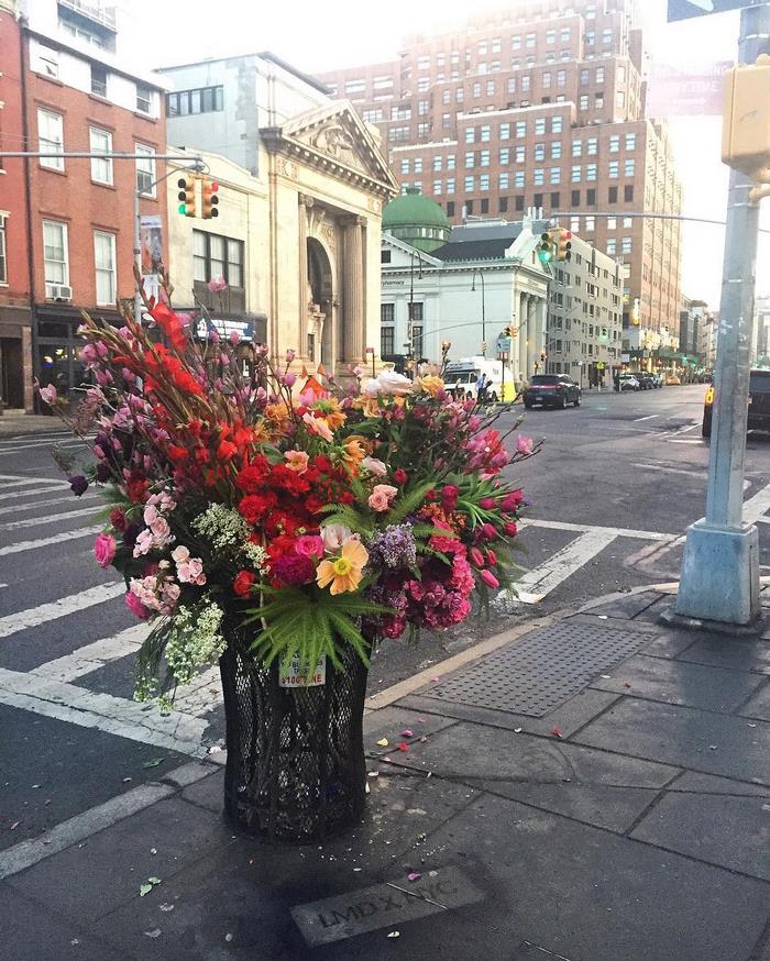 Crime Or Art? Someone Is Turning NYC Trash Cans Into Giant Vases Filled With Flowers