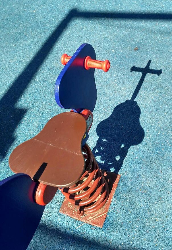 This Playground Shadow Looks Like A Cathedral Tower