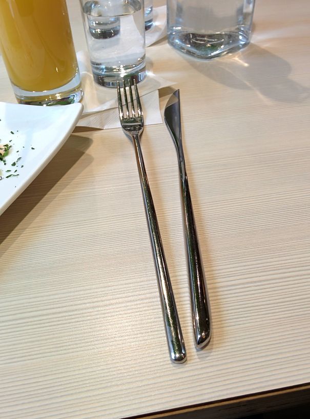 The Fork And Knife At This Restaurant Are Very Awkward